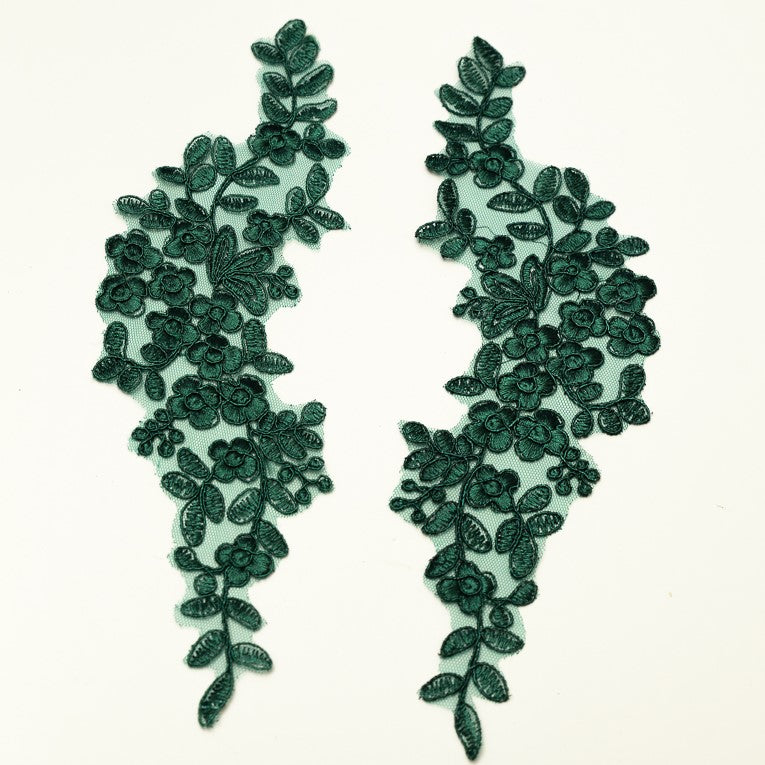 Bottle green embroidered floral applique pair laying flat on a white background.