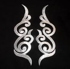 Mirrored pair of Silver scroll  cosplay   appliques. Embroidered with metallic silver thread in a baroque style.  