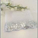 Silver sequin scalloped trim for dance and stage costumes 