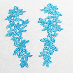 Heavily embroidered sea blue lace applique pair with a floral design.  This versatile applique pair can be embellished and decorated with crystals, pearls, beads and sequins for beautiful dance and stage costumes.