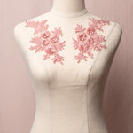 Mushroom pink embroidered floral applique pair with 3D flowers displayed on a mannequin.