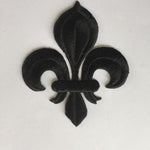 Heavily embroidered iron on black fleur de lis . This applique is perfect for cosplay amd historical costumes.