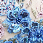 Blue 3D flower applique  with sequins and pearls .