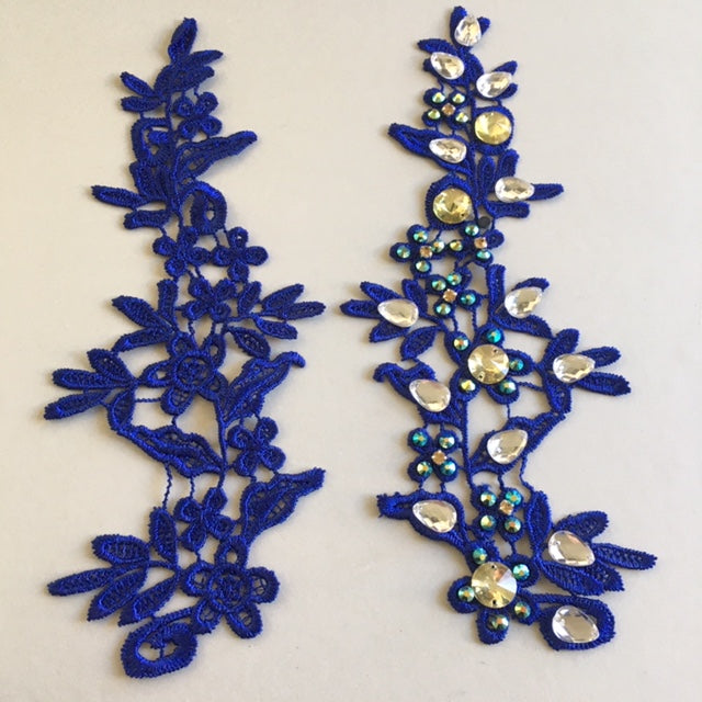 Heavily embroidered royal blue floral lace applique pair.  The applique on the right hand side has been embellished with crystals and gems. 