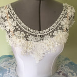 Gorgeous floral lace applique motif for embellishing bodices and necklines.