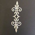 Single baroque style applique embroidered with metallic silver thread displayed on a black background.