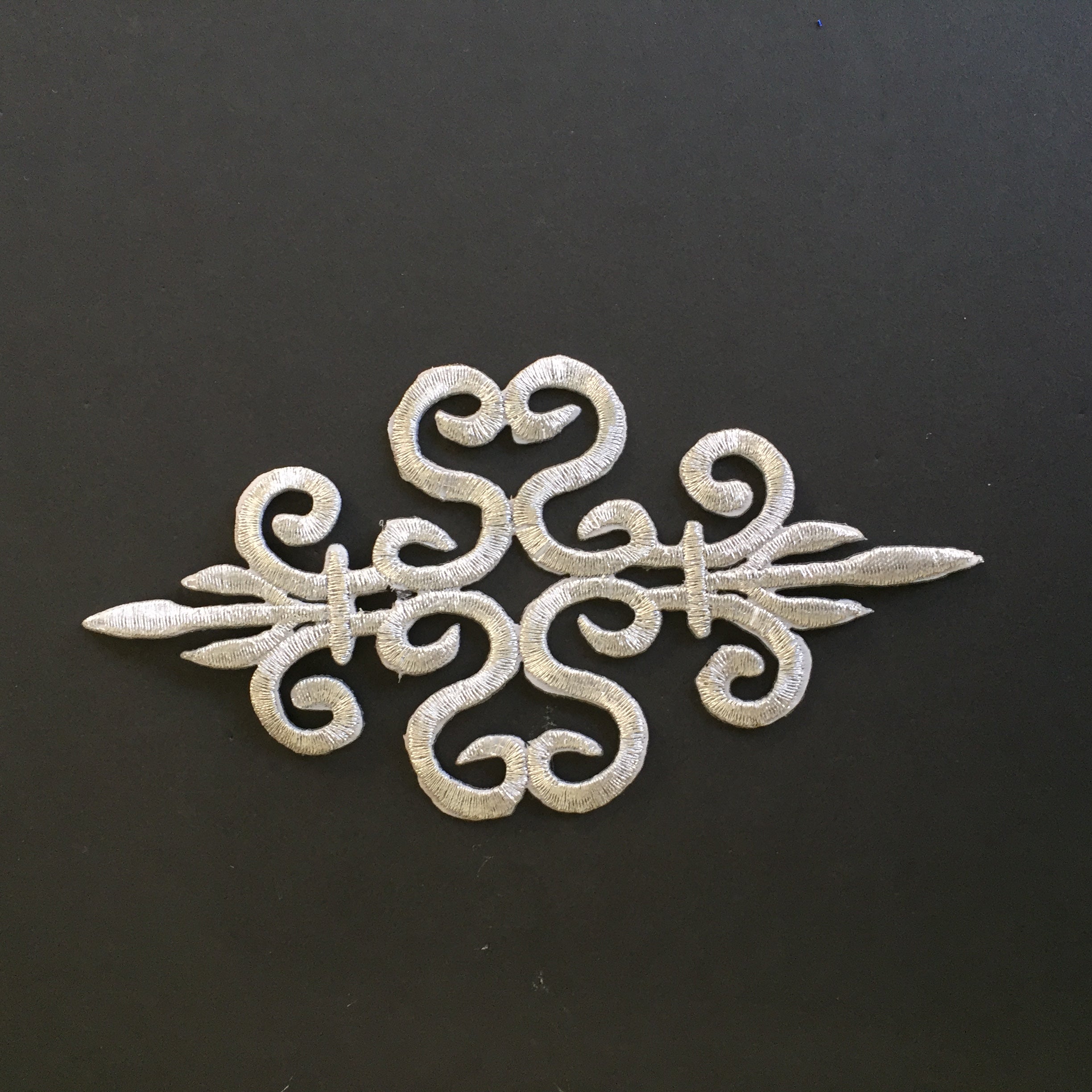 Silver embroidered scroll iron on baroque style applique patch. Suitable for dance and cosplay costumes 