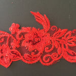 A lovely red lace trim that sparkles under stage lights and would be perfect for a lyrical costume or headpiece..