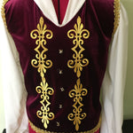 The iron on appliques are placed vertically on each side of the centre front to give a military look to  a boys dance costume .