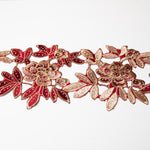 Heavily embroidered burgundy and gold floral iron on applique scattered with hot fix AB crystals.  The petals and leaves are outlined with gold thread.