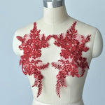 Beautiful burgundy applique embellished with sequins.