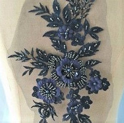 Navy blue beaded floral applique with 3D flowers.