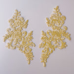Lemon yellow embroidered corded floral applique pair.